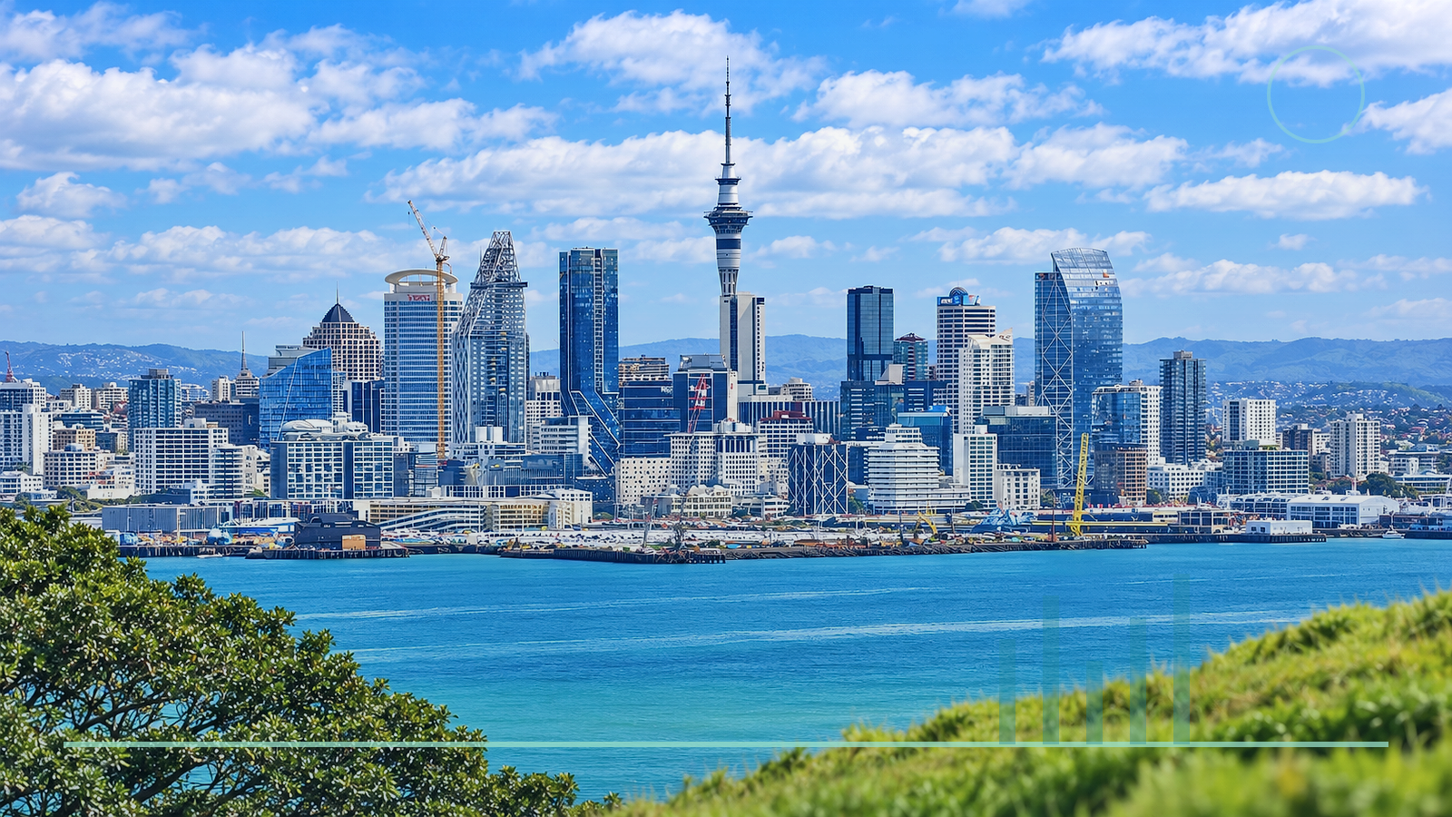 Auckland skyline and harbour Auckland’s skyline and Sky Tower sit above the harbour on a bright day